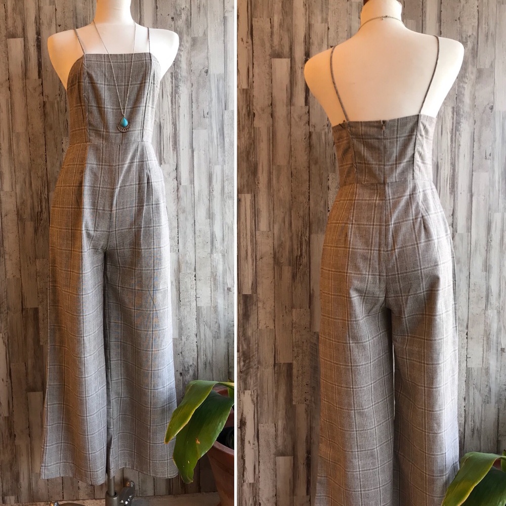 Plaid Spaghetti Strap Jumpsuit with leg flares.